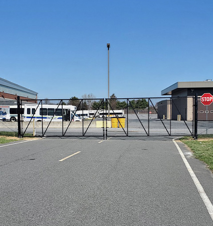 double gate with black pvc fence